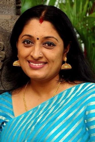 Urmila Unni as Devi in Irattakuttikalude Achan