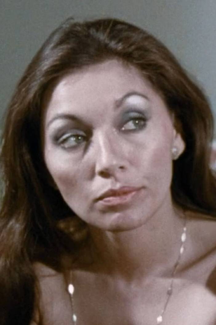 Maureen Ridley as Janice in Death Brings Roses