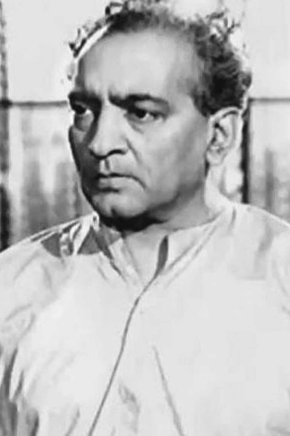 Pahadi Sanyal as Amrit Sen in Uttarayan