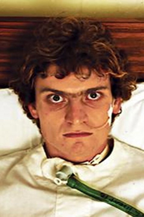 Robert Thompson as Patrick in Patrick