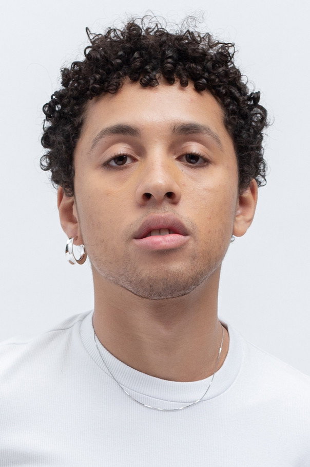 Jaboukie Young-White as Ethan Clade (voice) in Strange World