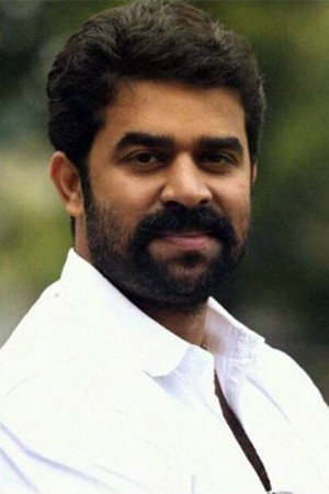 Vijay Babu as Ramakrishnan Bonacaud / Rambo in Mudhugauv