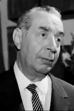 Γιώργος Γαβριηλίδης as Angelos Stamoulis in A Hero in His Slippers