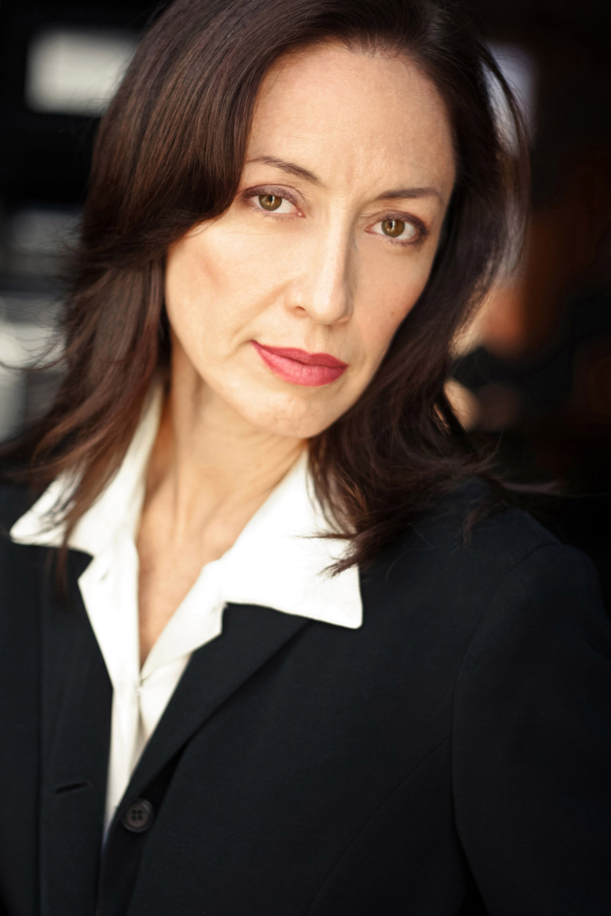 Carol Abney as Claudia Gillis in Visible Scars