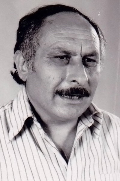 Βασίλης Τσάγκλος as Janitor in Young Lad at the School Desks