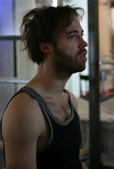 Ross Cowan as Dmitri in The Karamazovs
