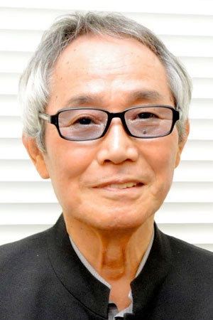 納谷六朗 as Inspector Dorai in Street Fighter II: V