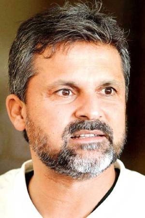 Moin Khan as Himself in Dennis Does Pakistan