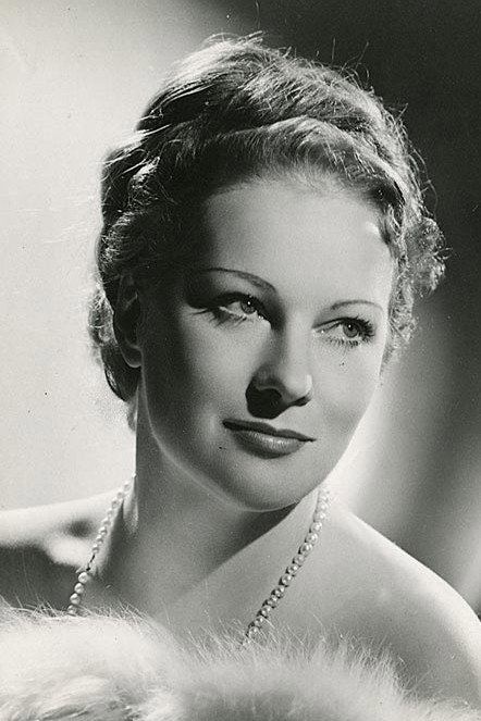 Diana Napier as Mme. Sidonie in Mimi