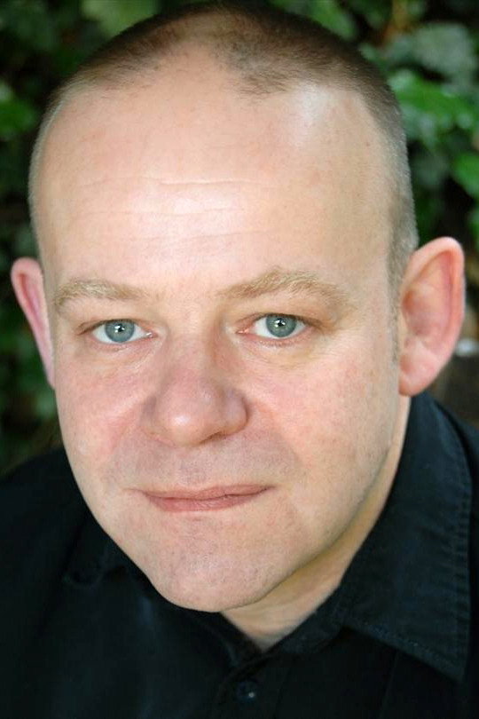 Huw Higginson as Trevor Ford in Top End Bub