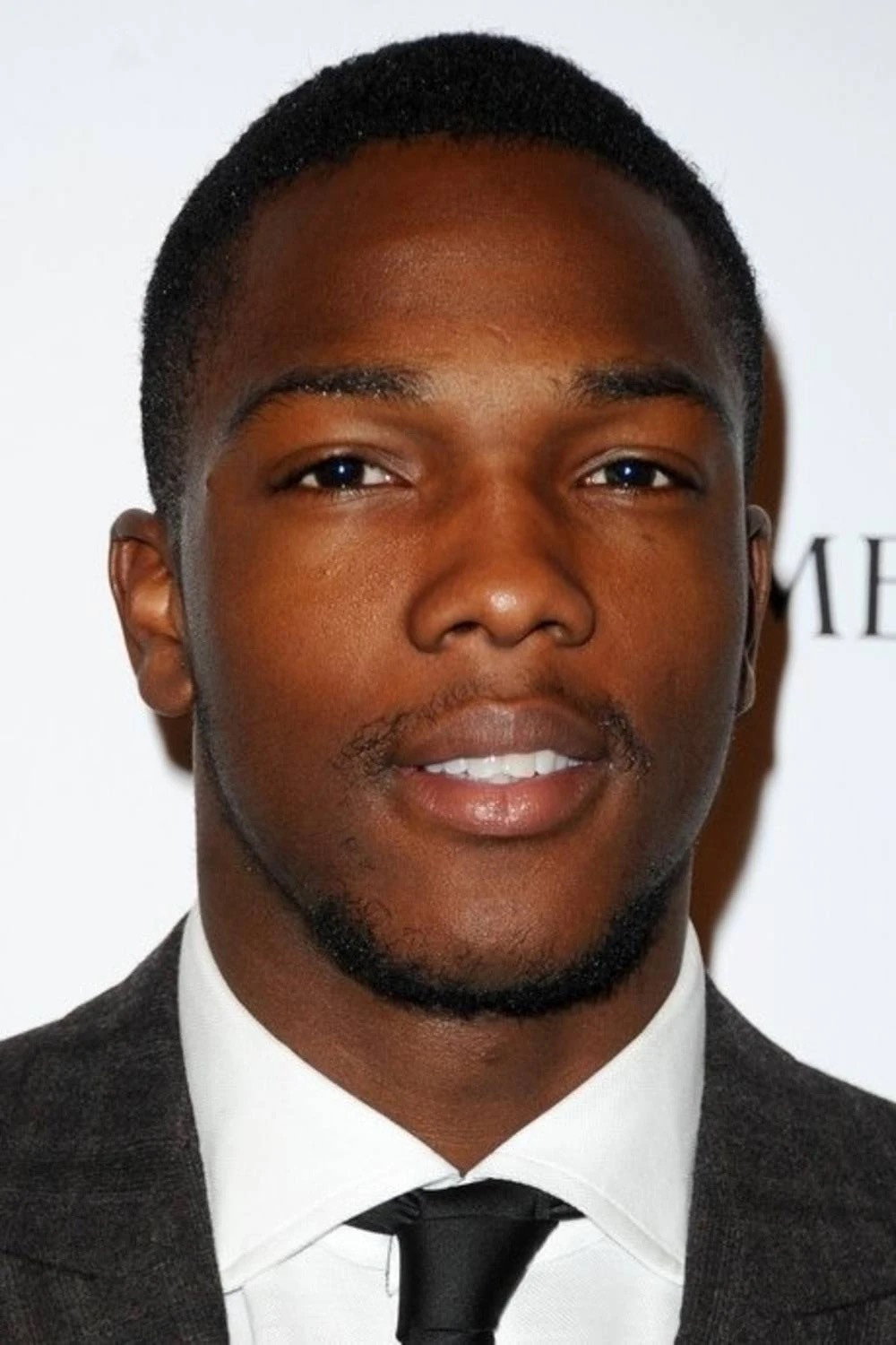 Tosin Cole as Andre in Honeytrap