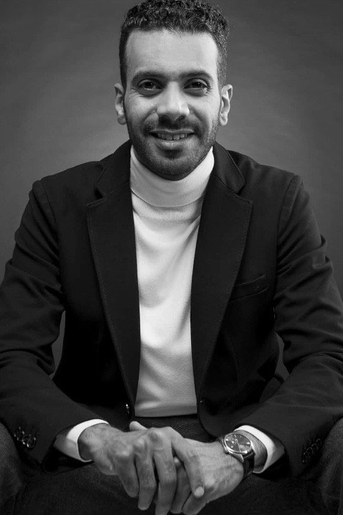 Faisal Aldokhei as Faisal in Wasati