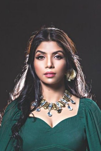 Quazi Nawshaba Ahmed as Journalist (Faria) in Borof Koler Golpo