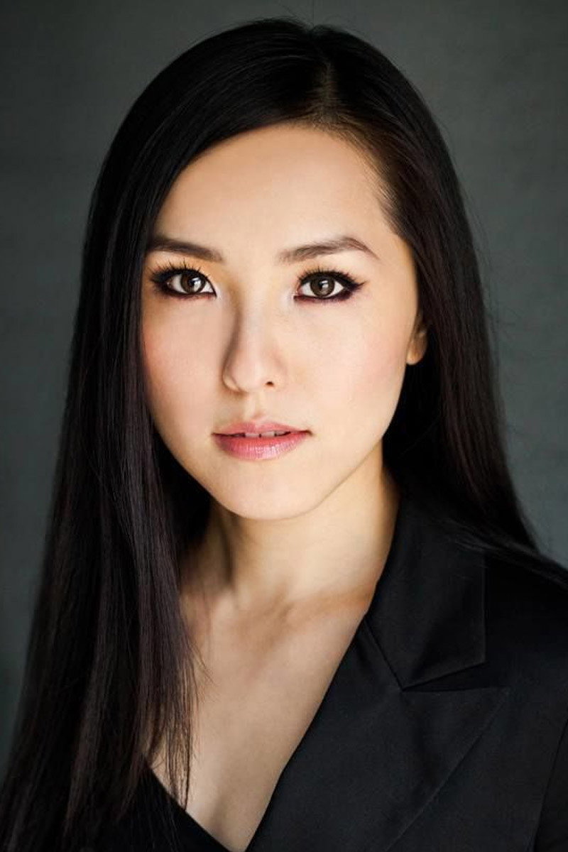 Vicky Huang as Sarah in Shadow of the Lotus