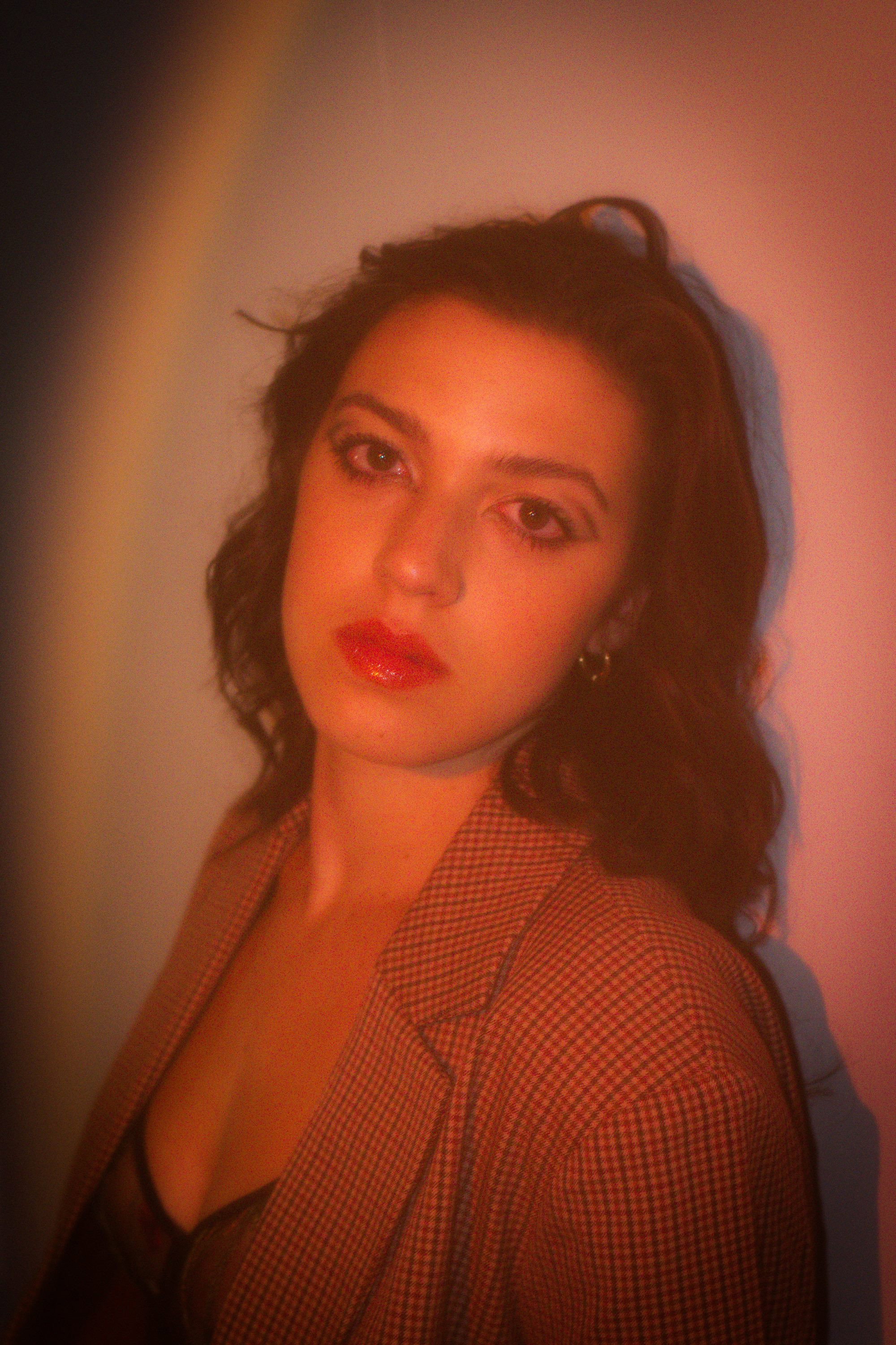 Sophia Anthony as Miriam Basconi in Saturnalia