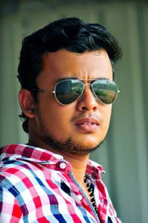 Arun Kumar as Tony in Mudhugauv