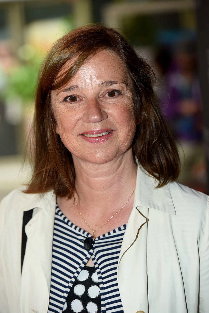 Lena Stolze as Andrea Dewenter in A Family of Three