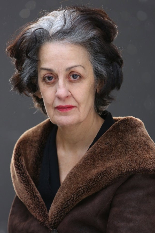 Dominique Valadié as Mme. Sartorius in Too Close to the Gods