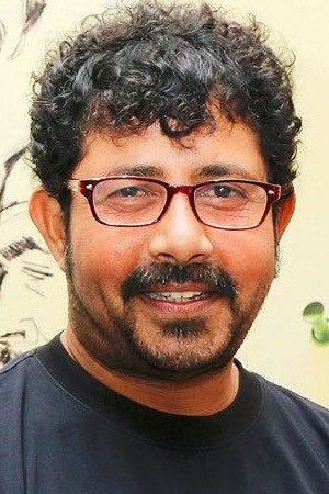 Pijush Ganguly as Tarun in Laptop