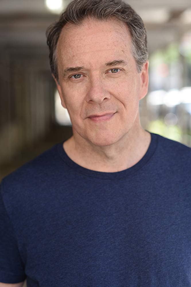 Jim O'Hare as Man in Black in Devoured