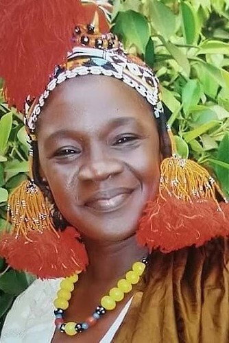 Maimouna Hélène Diarra as Aminate in Code Unknown