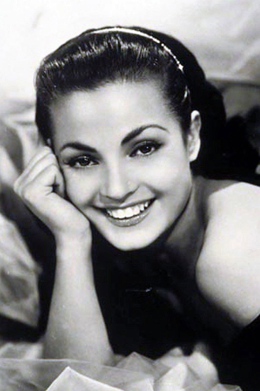 Carmen Sevilla as Rosana Cubero in Enseñar a un sinvergüenza