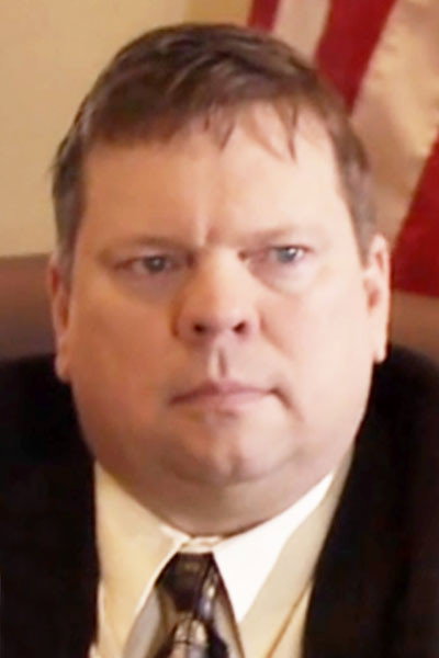Robert J. Baker as Assistant Director in Courage & Stupidity