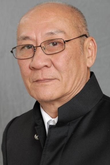 李家鼎 as John Wayne in The Inside Track