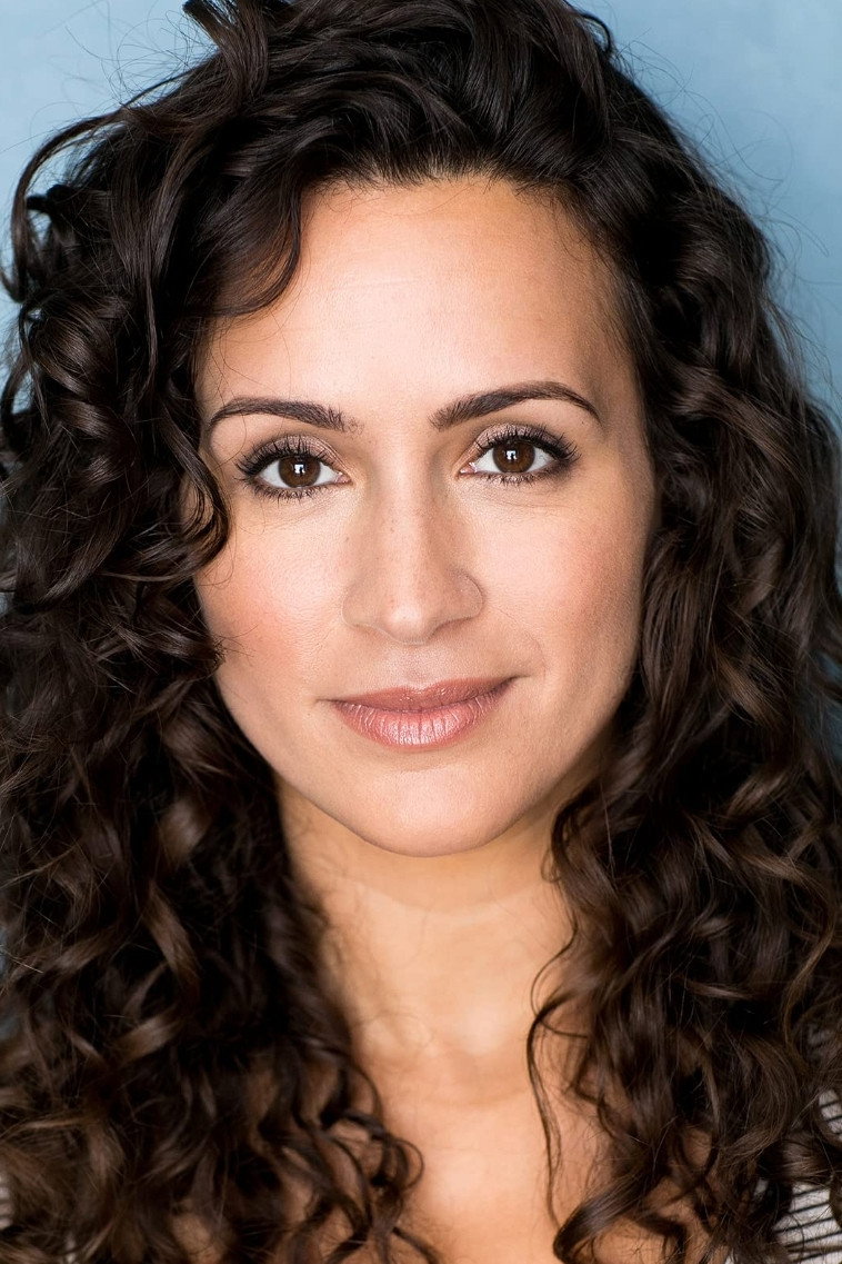 Melissa Marty as Pilar Tirado in Sweet Navidad
