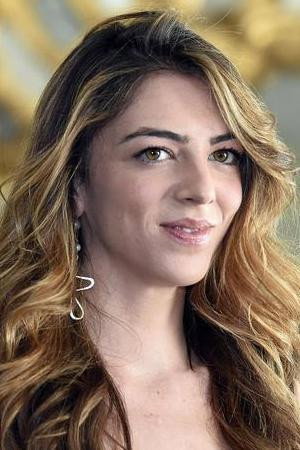 Giulia Andò as Santina in Strangeness
