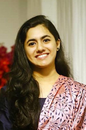 Femina George as Ponnila in Theeppori Benny