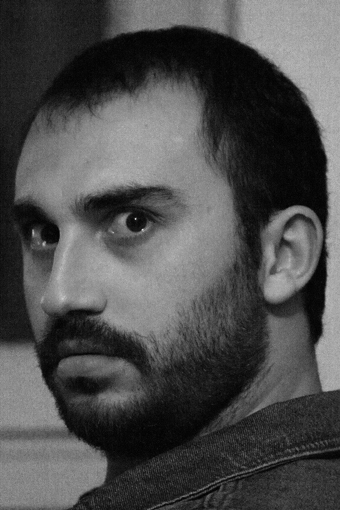 Enes Furkan Yazan as Man, Man II (Photographer), Reflection in Achilles' Nose