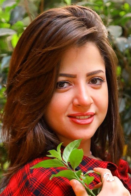 Mona Farouk as علا السكرتيرة in The President's Shadow