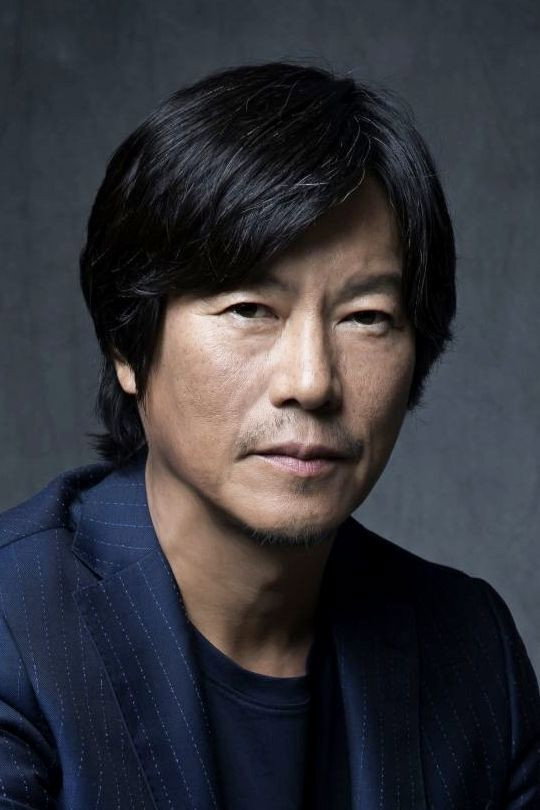 豊川悦司 as Harrison Yamanaka in Tokyo Swindlers