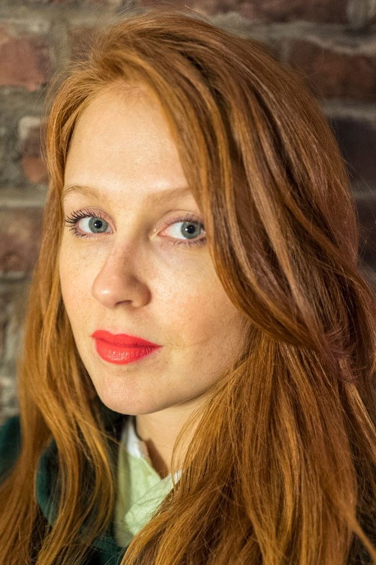 Elizabeth Wood as Erica in Love Conquers Paul