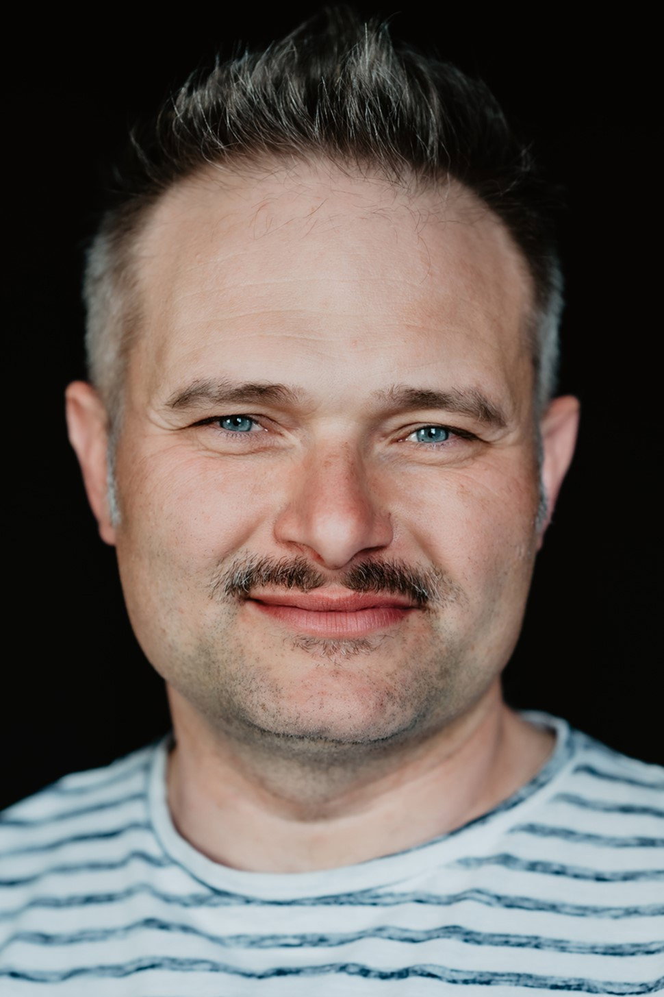 Wojciech Czerwiński as Damian "Denis" Wilk in Mountain Rescue Team