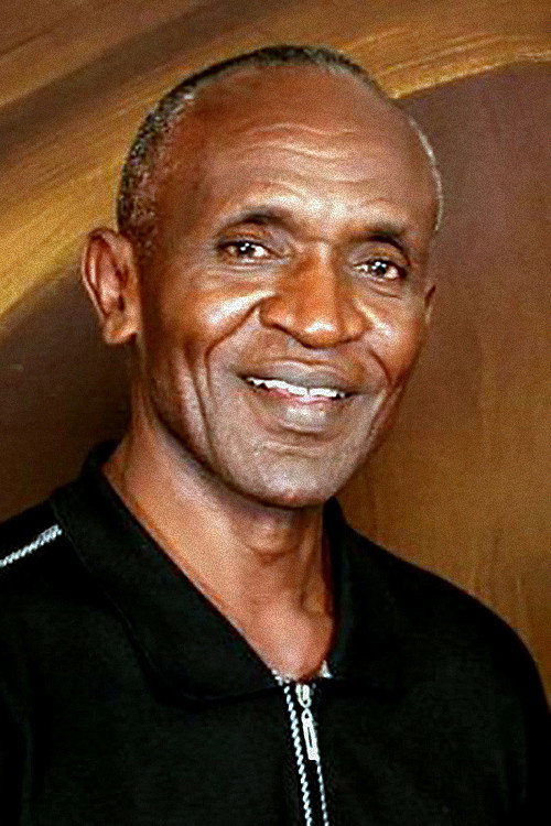 Michael Wawuyo as Detective Morais in Escape from Uganda
