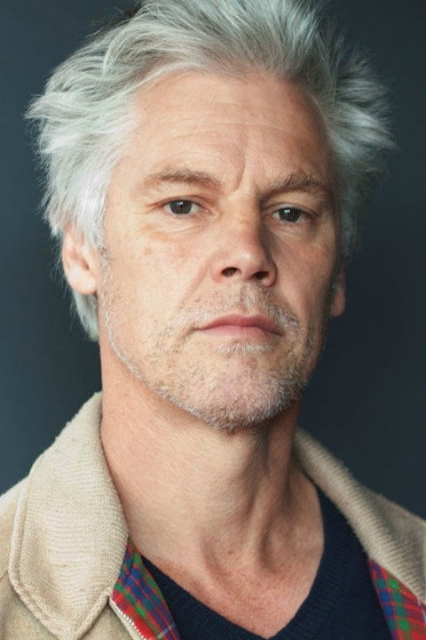 Peter Daube as Tank Man (segment 'Eau de la vie') / Paul (segment 'Bitch') in Dark Stories: Tales from Beyond the Grave