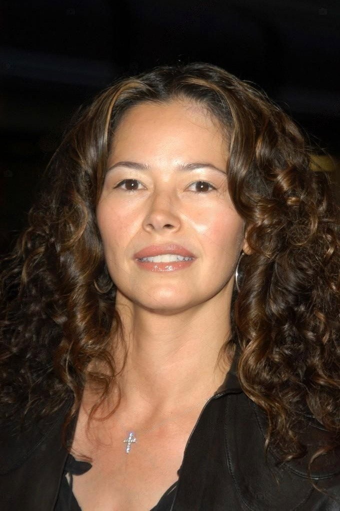 Angela Alvarado as Gloria Olarte in Boss of Bosses