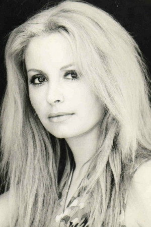 Evi Farinelli as Prof.ssa Evi Rossi in The Clan of the Two Borsalini