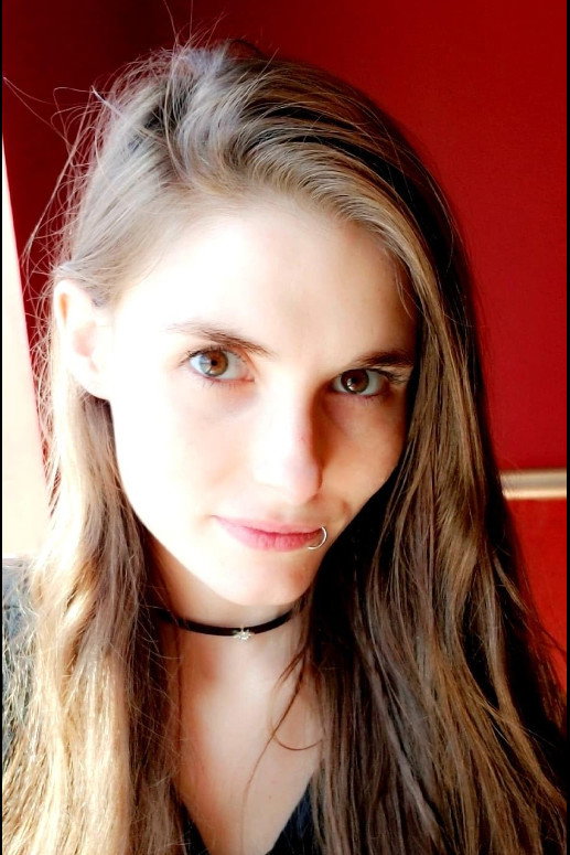 Hanleigh Baker as Bela in 10/31