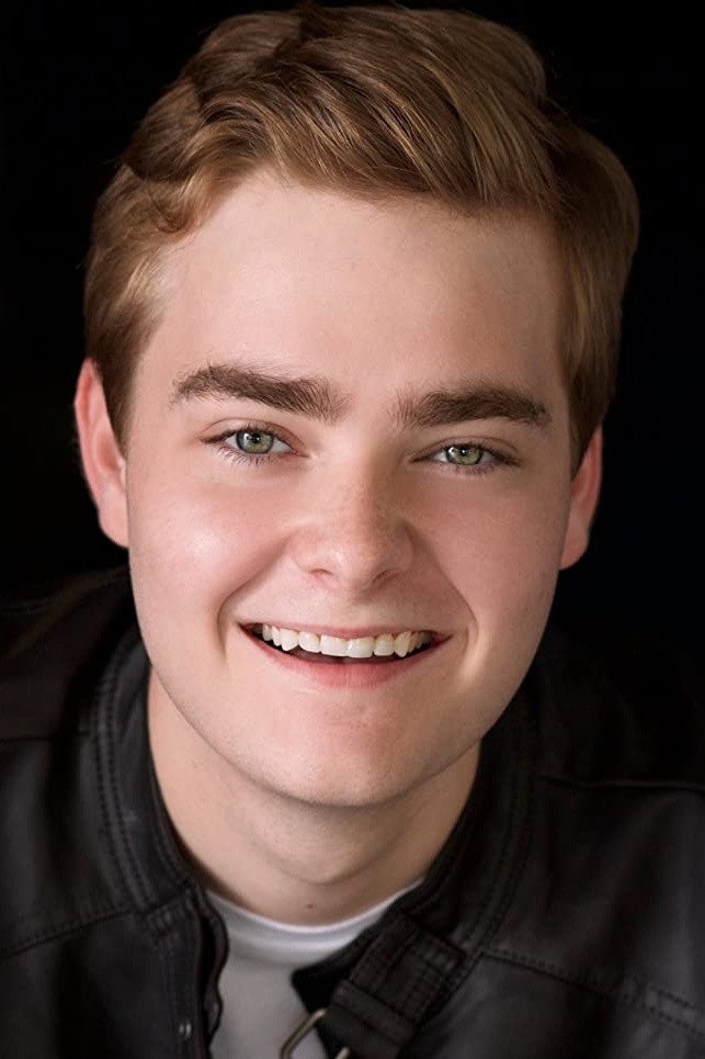 Zack Shires as Dullbert Finkelsteen in Table 58