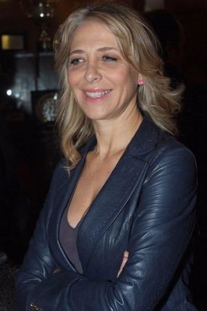 Emanuela Rossi as Gilda (voice) in Adrian