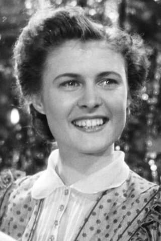 Anne-Marie Blanc as Miss Patrick in Hotel Royal