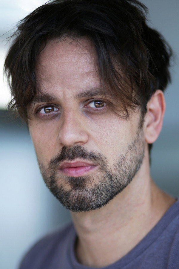 Ivan Alovisio as Ophthalmologist in Dark Glasses