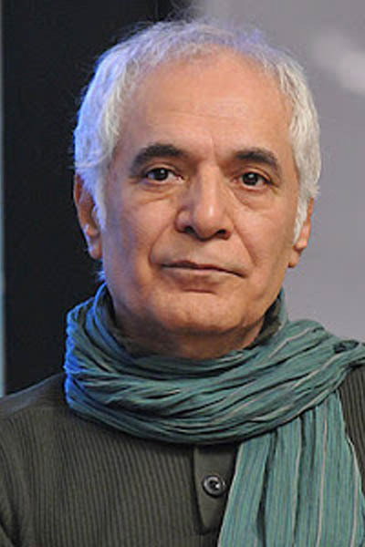 Mahmoud Kalari as Mitra's father in Bomb: A Love Story