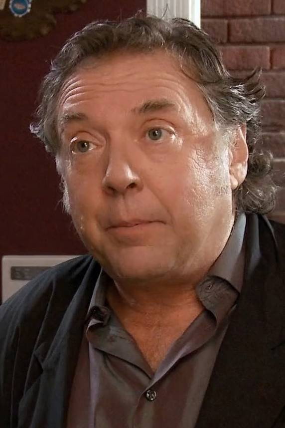 Michael Gaglio as Hank in The Christmas Campaign