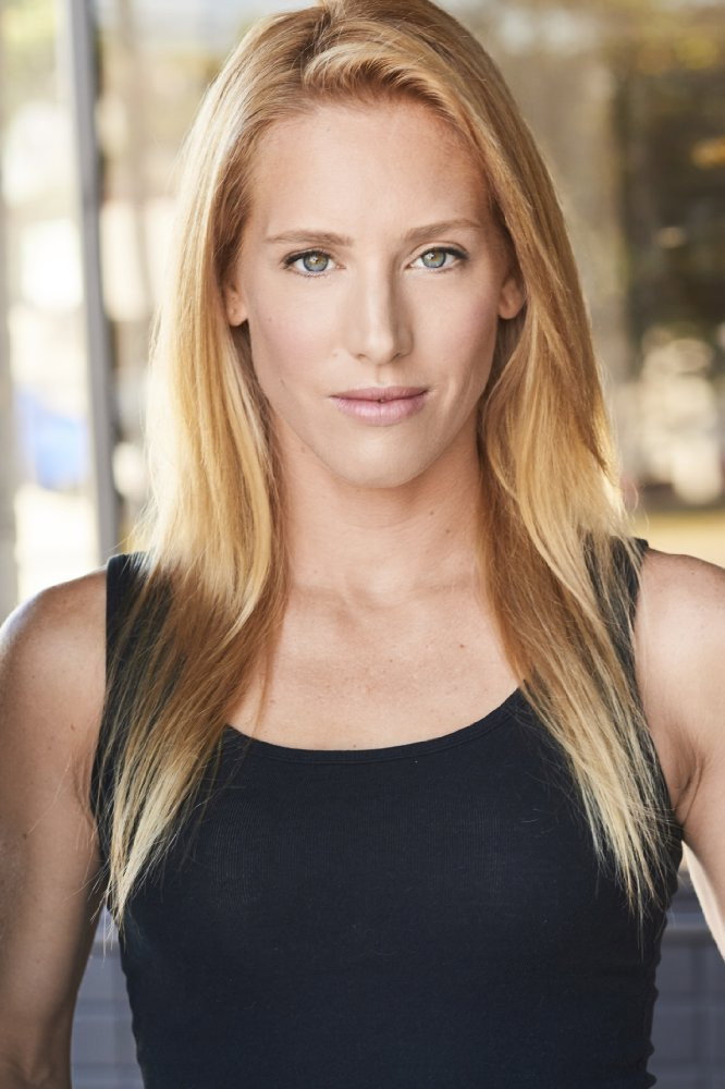 Jenna Parker as Tracy in Ice Sharks