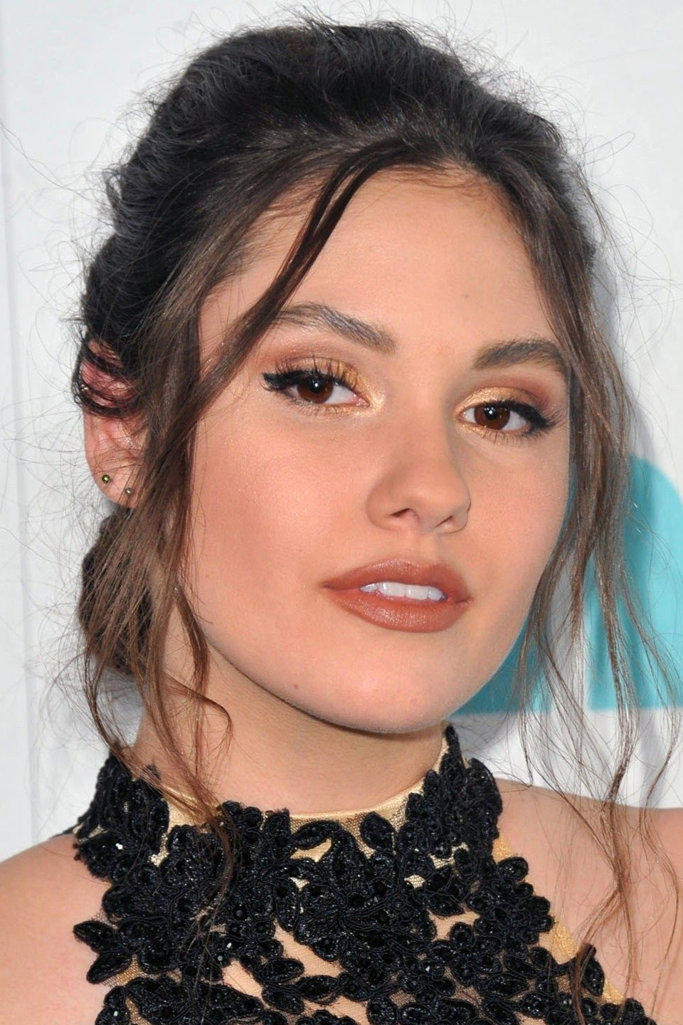 Ronni Hawk as Tomi Shaw in Girl With a Gun