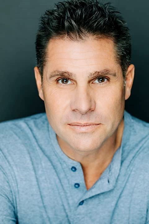 Conan Graham as Tom Chandler in Under the Mistletoe